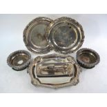 A pair of Old Sheffield Plate 26 cm dishes with scroll rims,