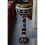 A tall and impressive Doulton Lambeth jardiniere and matching stand,