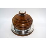 A World War I turned wood pot and cover with silver mounts,