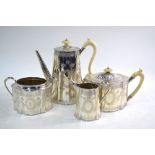 A fine quality Victorian engraved silver four-piece tea/coffee service of tapering serpentine form,