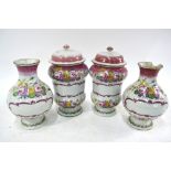 Two 19th century Continental faience apothecary jars and covers,