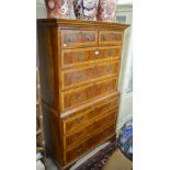 A walnut veneered and crossbanded chest on chest of two short & six long drawers,