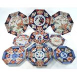 Four Japanese Imari dishes of octofoil form, comprising: a pair decorated with a kacho-ga of Tsuru,