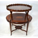 A Sheraton Revival two tier stand of ovoid form, inlaid with shell motif,