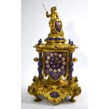 A Victorian English gilt brass carriage clock, striking on a coiled gong, enamel dial,