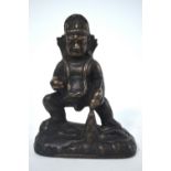 A Himalayan metal figure of Kubera, the Deity of Wealth and Regent of the North,