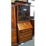 A George III mahogany bureau bookcase,