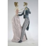 A Lladro figure of a dancing couple in evening dress, no.1372, 31.