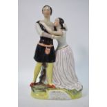 A 19th century Staffordshire group depicting Romeo & Juliet, 27.