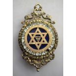 A Victorian silver gilt Masonic jewel set with white paste and dark blue enamel, London 1860,