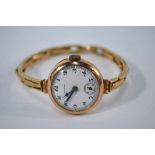 A Lady's Buren 9ct wristwatch with 15 jewel movement and expanding bracelet strap,