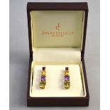 A pair of graduated drop earrings set garnet, citrine, amethyst and pale peridot, 9ct yellow gold,