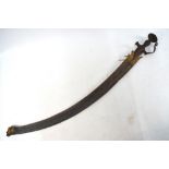 An Indian talwar with typical curved blade and hilt, in a fitted scabbard,