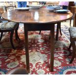 A Georgian style mahogany drop leaf 'wake' dining table, the ovoid top raised on square legs,