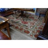 An Anatol wool carpet, floral design on ivory ground with conforming border,