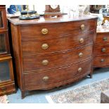 A George III mahogany bow front chest of four long graduated drawers raised on splayed bracket feet