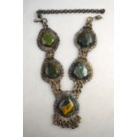 An Eastern style necklace set with vari-coloured agate