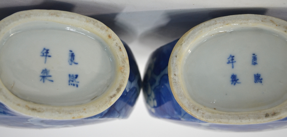 A pair of blue and white pilgrim flasks, each one decorated with a design of prunus in flower; 21. - Image 4 of 5