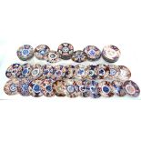 A Collection of 54 Japanese or other Imari dishes, some of kikugata form and some with green enamel,