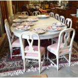Note: Revised estimate - A large French painted wood extending dining table in the Gustavian style