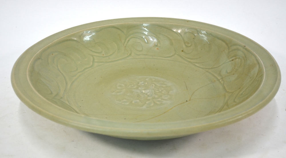 A Ming celadon dish of circular form, decorated at the centre with a floral spray, - Image 3 of 6