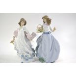 Two Lladro figurines - both girls in flowing gowns and carrying baskets of flowers,