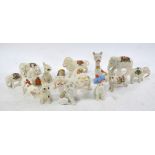 A collection of crested animals to include four elephants,