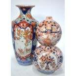An Imari double gourd vase, decorated in typical underglaze blue,
