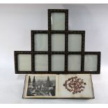 A 'Tramp Art' cork frame with nine frames;