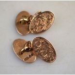 A pair of 9ct yellow gold oval engraved chain link cufflinks,