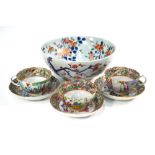 An associated set of three Canton, famille rose cups and saucers,