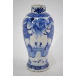 A Chinese blue and white baluster vase decorated with Scholars in a mountainous retreat;