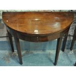 A Victorian mahogany demi-lune fold over tea table,