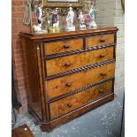 A North Italian burr walnut chest of two short over three long graduated drawers each having