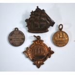 A small brooch designed as HMS Victory,