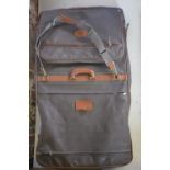A Mulberry Scotchgrain brown leather gentleman's suit carrier with shoulder strap