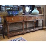 An 18th / 19th century oak low dresser,