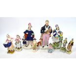 A collection of nine 19th century Staffordshire figures including Sir Walter Scott, 28 cm high,