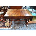 A Regency cross-banded figured mahogany sofa table,