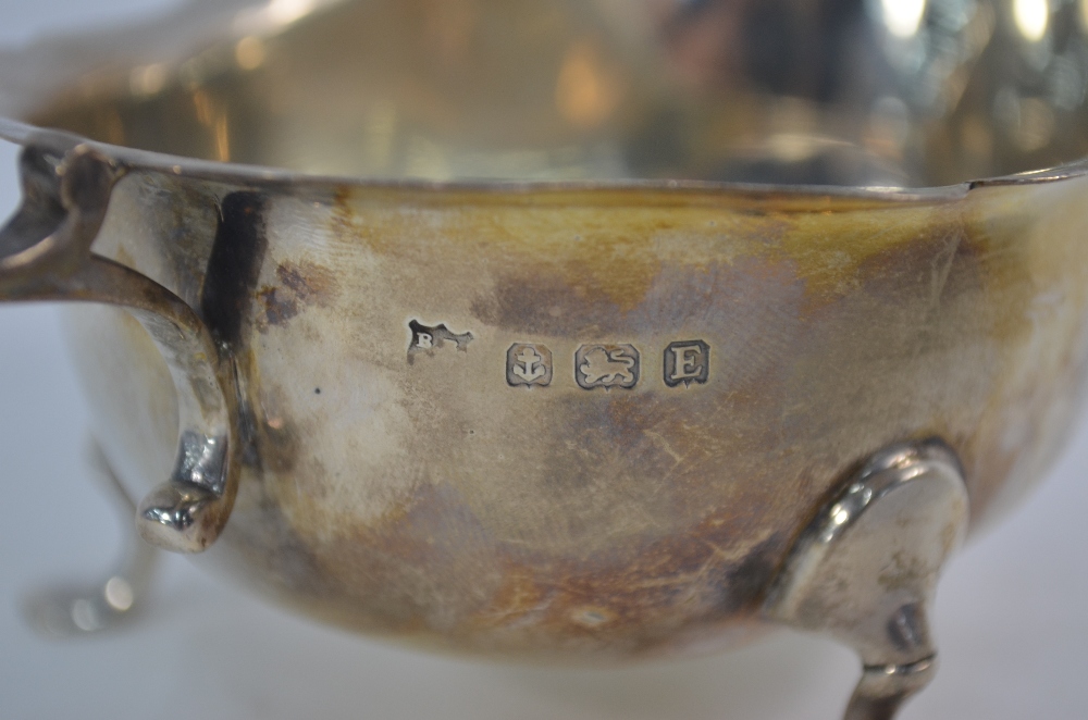 A near-matched pair of silver sauce boats with cut rims, scroll handles and pad feet, - Image 4 of 4