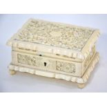 A Canton ivory box with hinged cover,