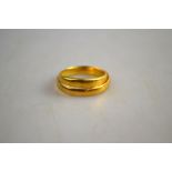 A 22ct plain wedding band, size U 1/2 to/w unmarked yellow metal wedding band, distorted,