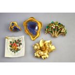 A Corograft statement brooch and earring suite set with blue stones,