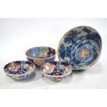 An Imari bowl; the interior decorated in underglaze blue,