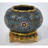 A Chinese blue ground cloisonne enamel water pot on a gilt stand with three feet;
