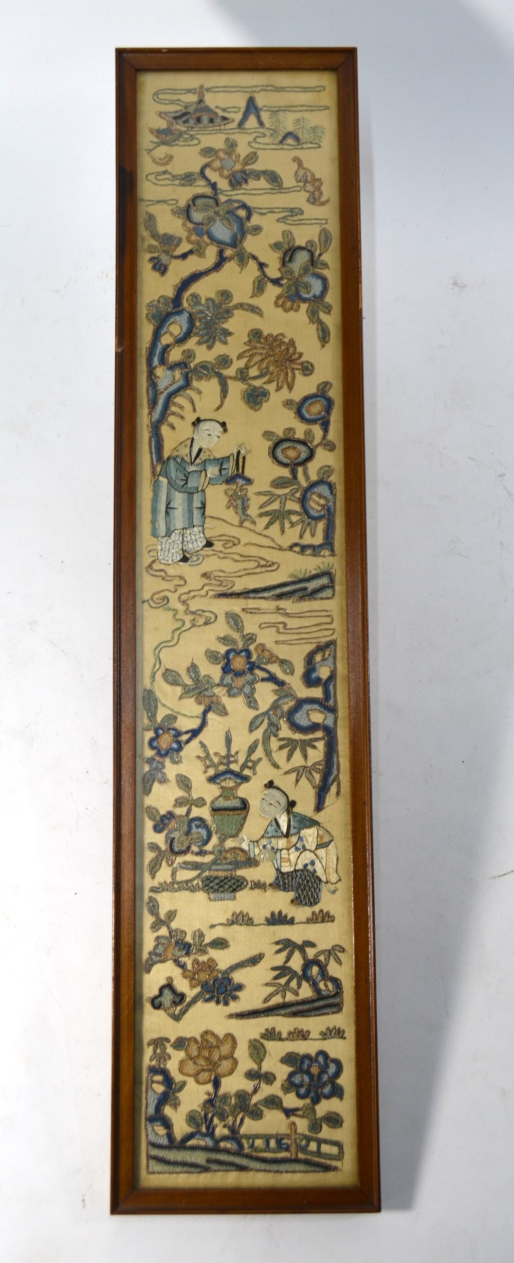 A Chinese textile sleeve band of typical rectangular form,