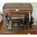 A hand-turned sewing machine 'The Gloria'