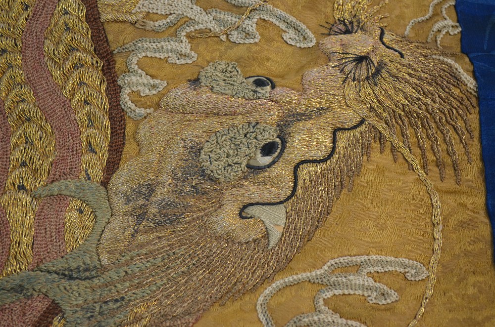 Four small Chinese textiles, together with a dragon decorated, - Image 6 of 7