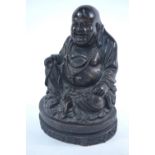 An imitation bronze figure of Budai,
