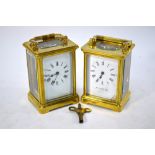 Two brass carriage clocks of traditional form,